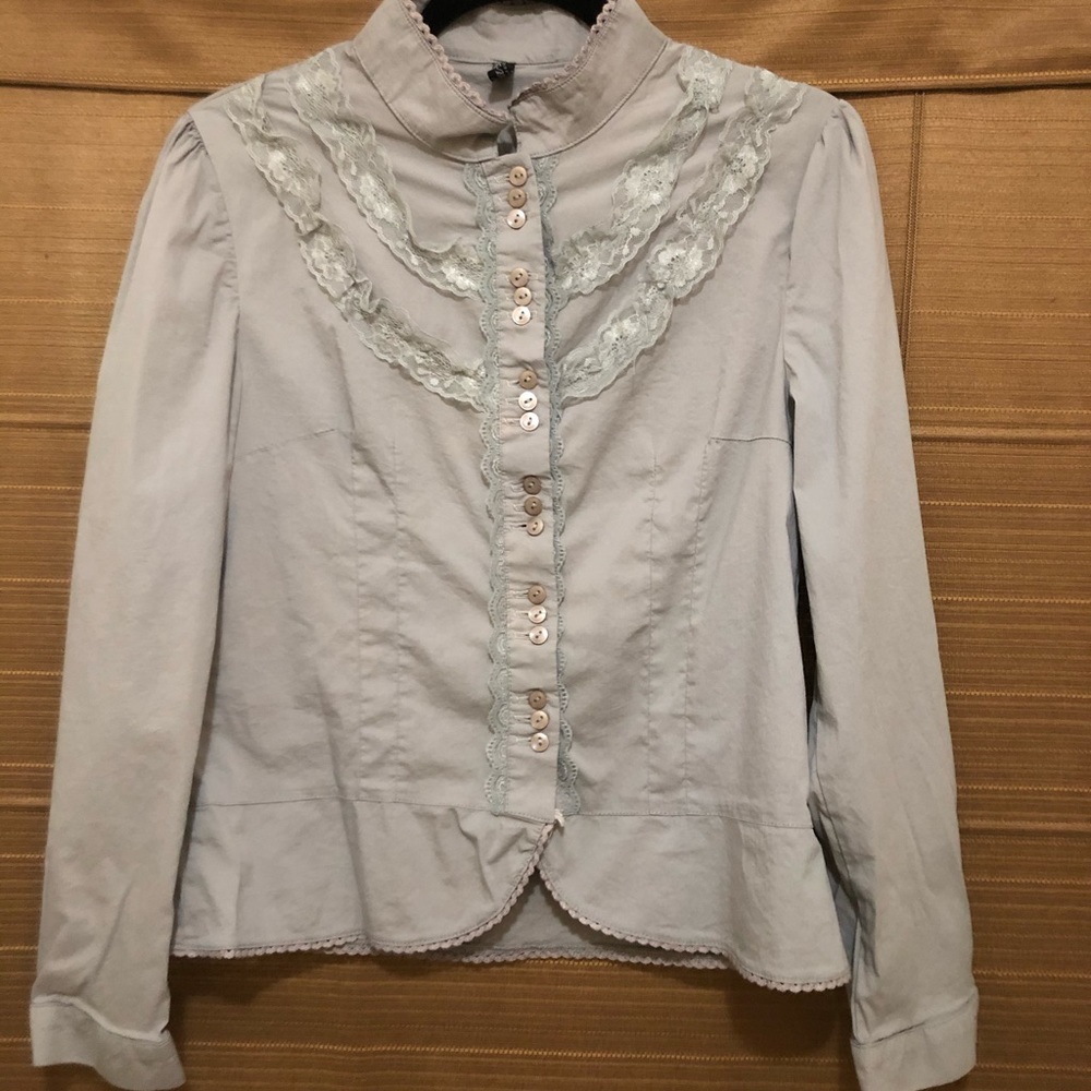 Grey feminine blouse.
